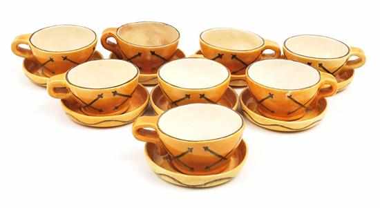 Appraisal: FRED MANN AN EIGHT PIECE CUP AND SAUCER SOUP SET