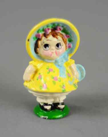 Appraisal: DOLLY DIMPLE PAPERWEIGHT Hubley colorfully painted amusing figural cast iron