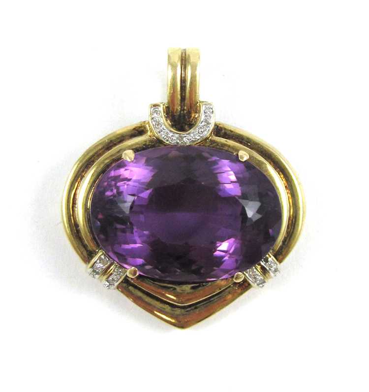 Appraisal: AMETHYST DIAMOND AND FOURTEEN KARAT GOLD PENDANT with round-cut diamonds