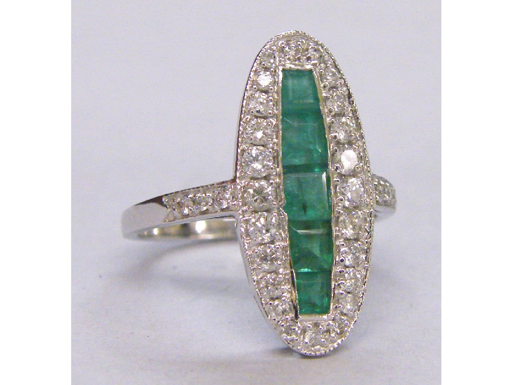 Appraisal: Georgian style ct white gold emerald and diamond oval cluster