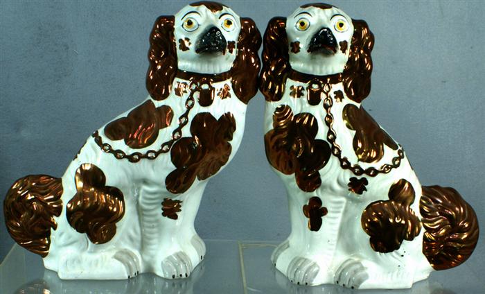 Appraisal: English Staffordshire large pair of lustre decorated spaniels h c