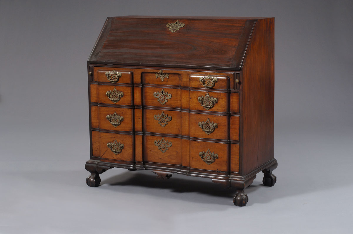 Appraisal: MASSACHUSETTS CHIPPENDALE CARVED MAHOGANY BLOCKFRONT SLANT-LID DESK The oblong thumbmolded