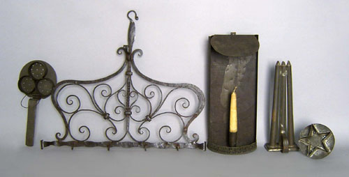 Appraisal: Metalware to include tin sconce candlemold poacher and cookie cutter