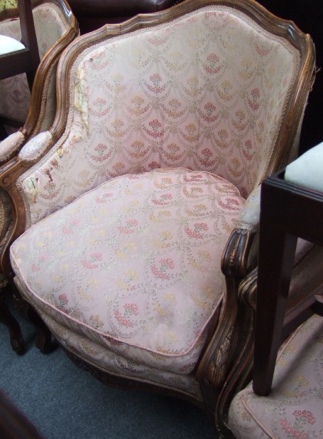 Appraisal: A pair of Louis XV style beech framed tub chairs