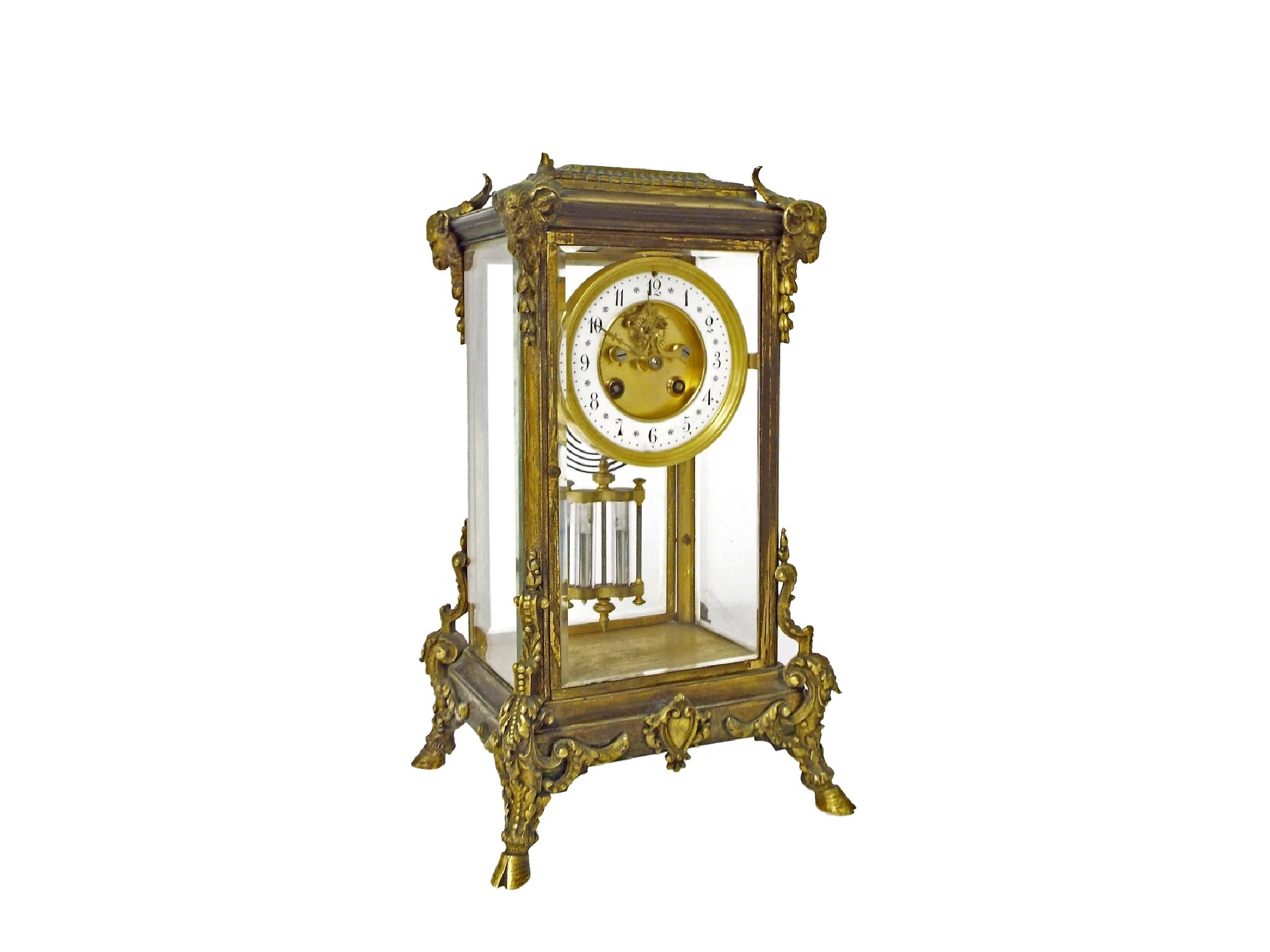 Appraisal: French ornate gilt metal four glass two train mantel clock