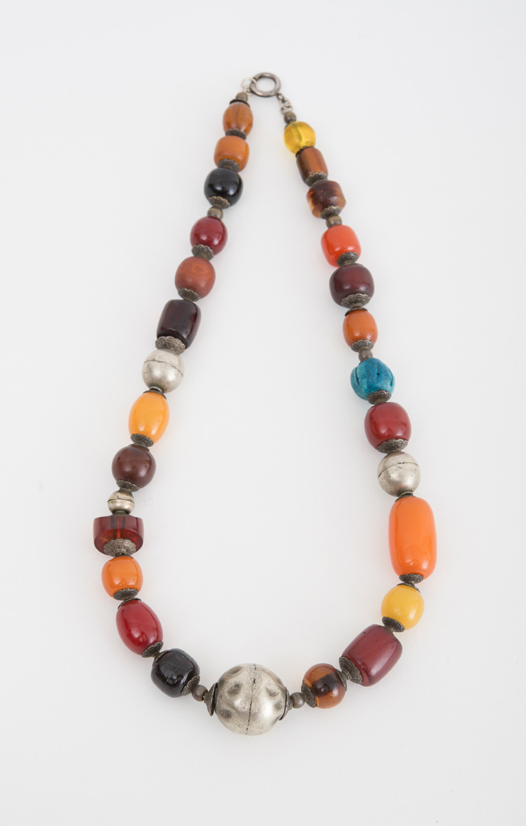 Appraisal: BRASS GLASS BEAD AND HARDSTONE NECKLACE Together with a stone