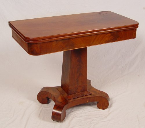 Appraisal: EMPIRE PERIOD PEDESTAL GAME TABLE Lift top mahogany table single