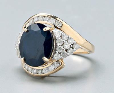 Appraisal: Lady's sapphire and diamond ring centering one oval faceted intense