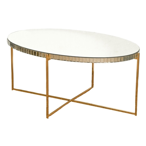 Appraisal: An oval glass topped polished metal coffee table