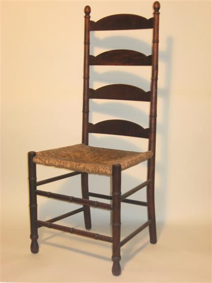 Appraisal: Rush seat ladder back side chair th century The shaped