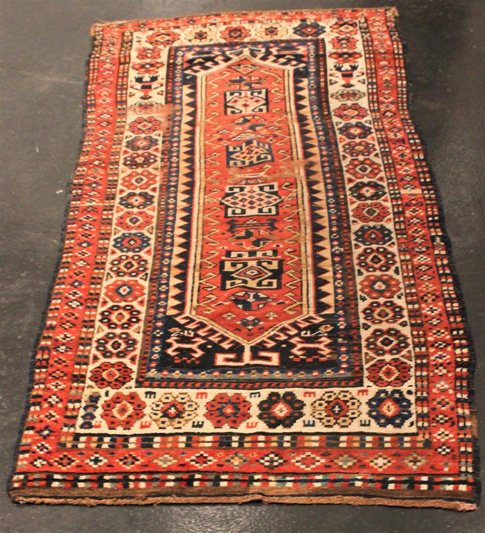 Appraisal: TRIBAL RUNNER AND BAKHTIARI RUG with a red ground and