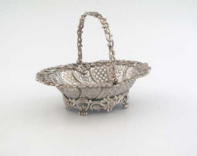 Appraisal: A George II sweetmeat basket with fret pierced sides a