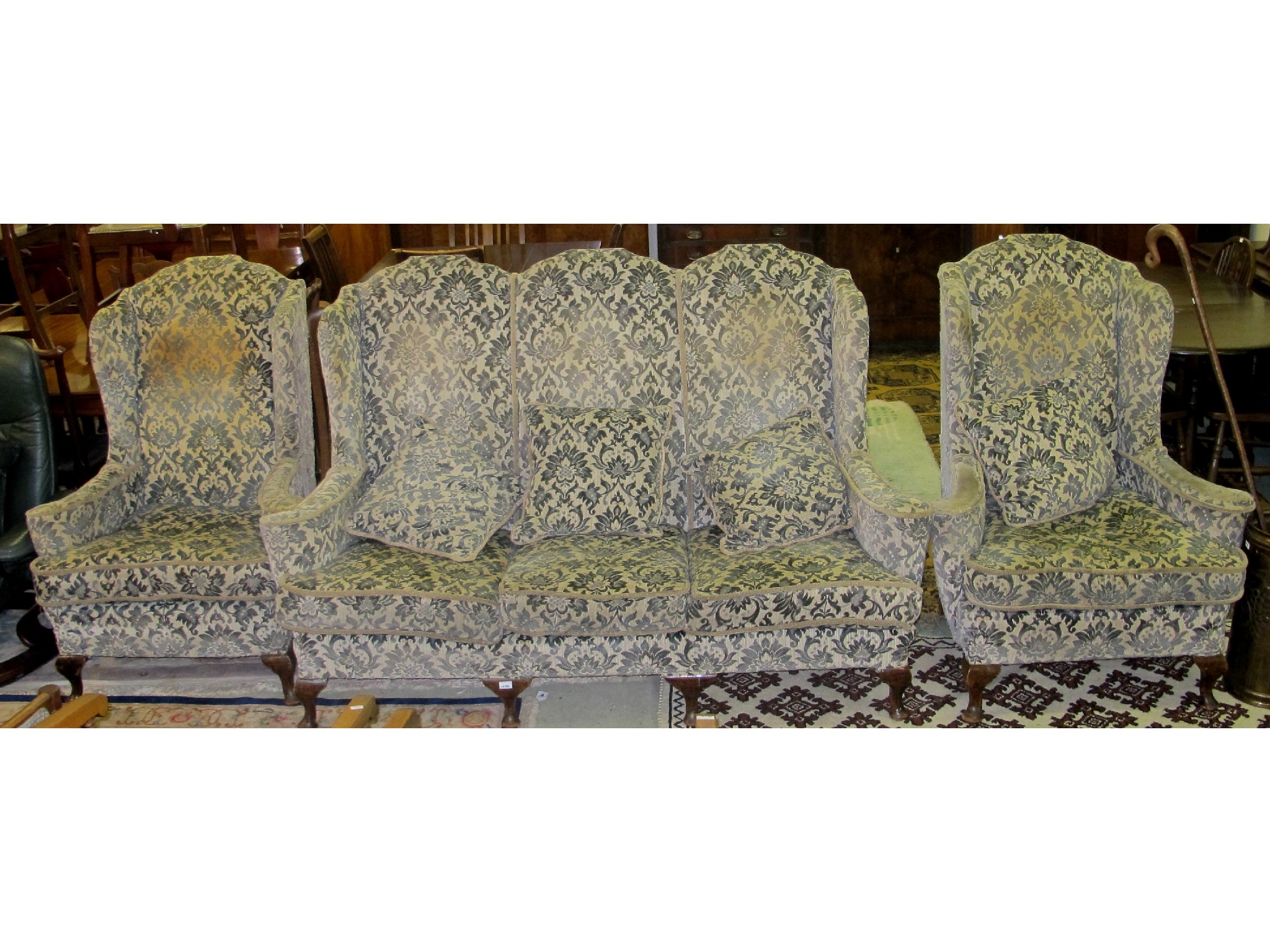 Appraisal: Three seater high back settee and two armchairs