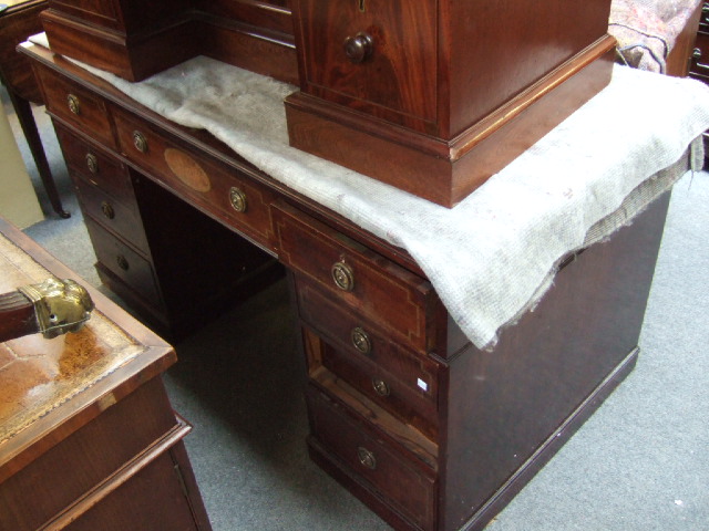 Appraisal: An Edwardian mahogany and inlaid pedestal desk with oval inlaid