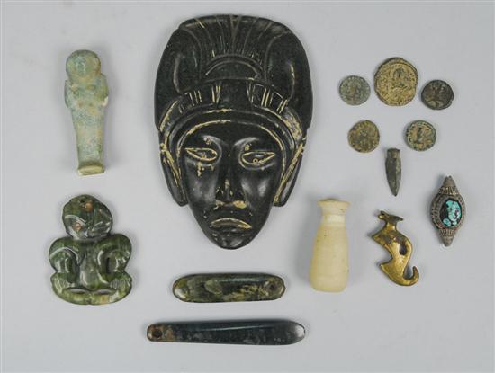 Appraisal: COLLECTION OF ARTIFACTS including a carved stone amulet height inches