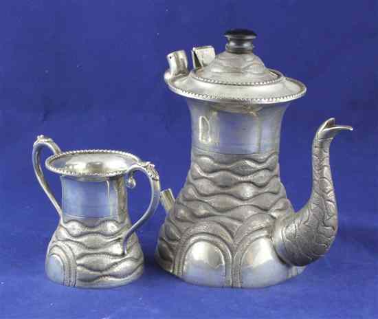 Appraisal: An Indian white metal coffee pot and sugar bowl each