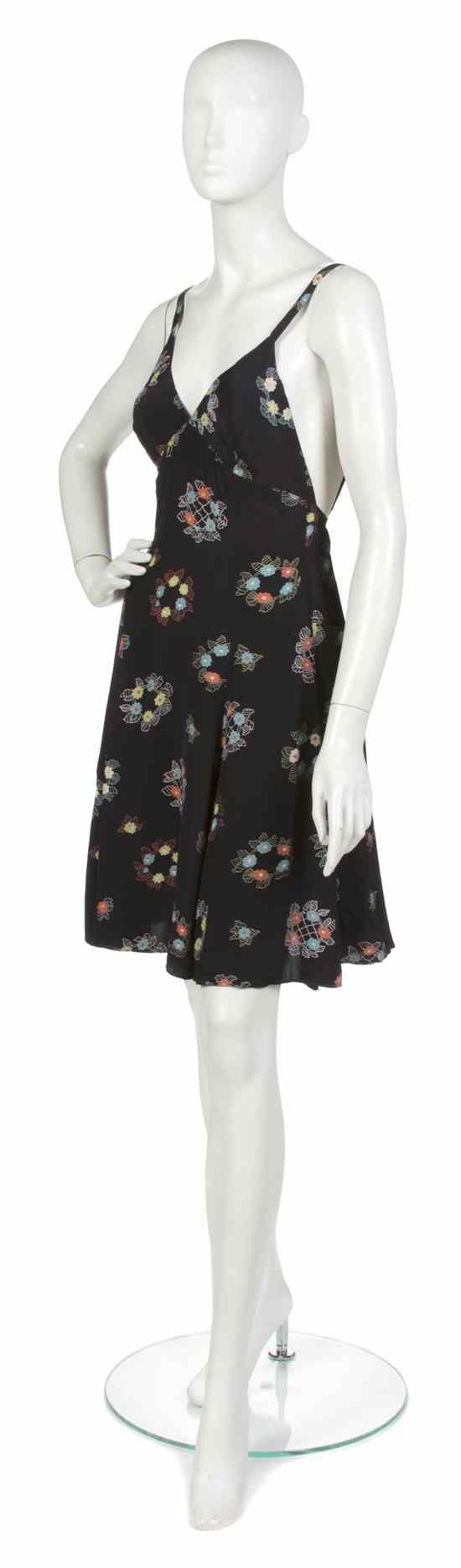 Appraisal: An Ossie Clark Navy Printed Silk Dress allover flower wreath