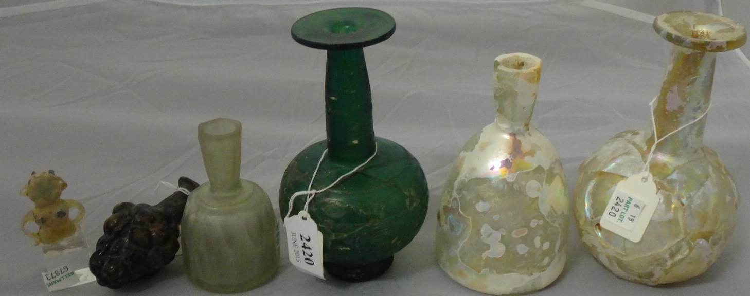 Appraisal: Six Islamic glass vessels Iran th- th century comprising a