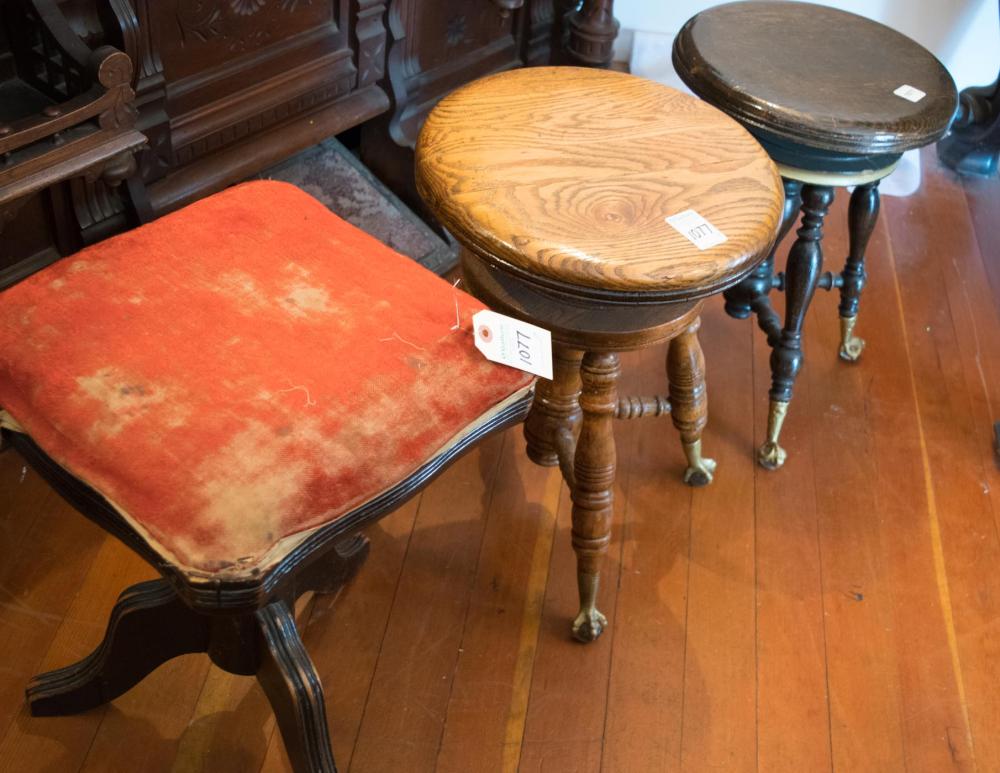 Appraisal: THREE AMERICAN ANTIQUE PIANO STOOLS two with round revolving oak