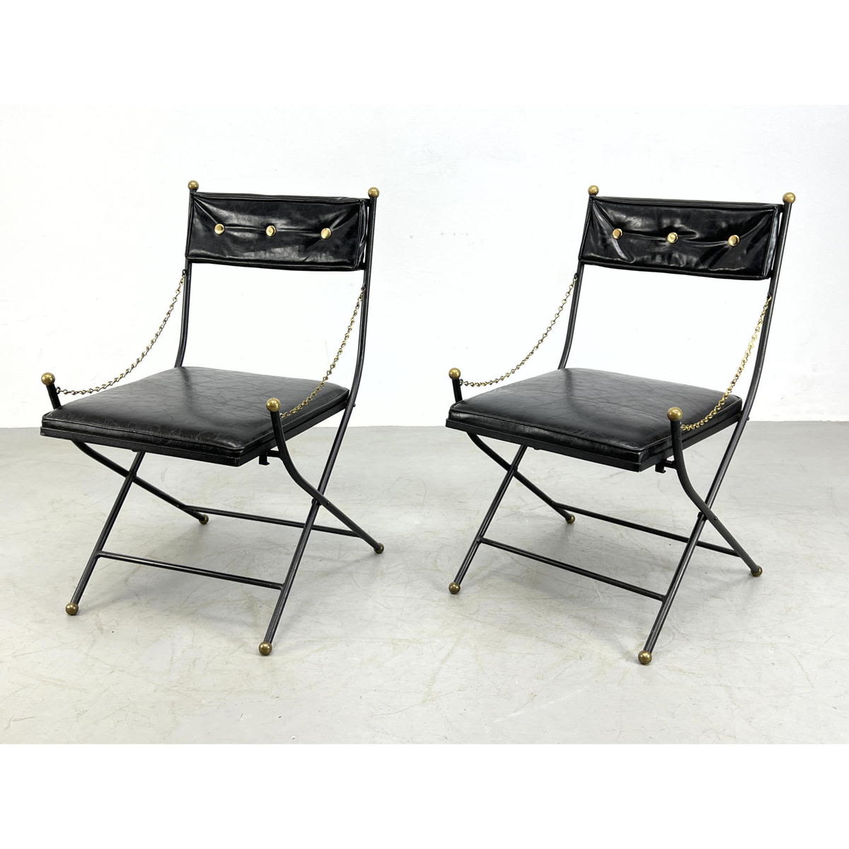 Appraisal: Pr Iron campaign chairs with brass balls Folding Dimensions H