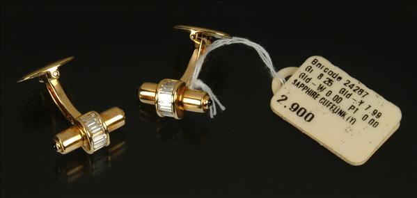 Appraisal: A pair of carat yellow gold and diamond cufflinks the