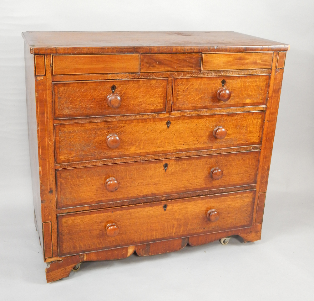 Appraisal: A George IV oak and mahogany crossbanded chest of drawers