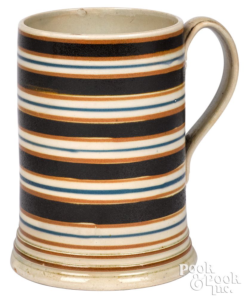 Appraisal: Mocha mug with brown tan and blue bands Mocha mug