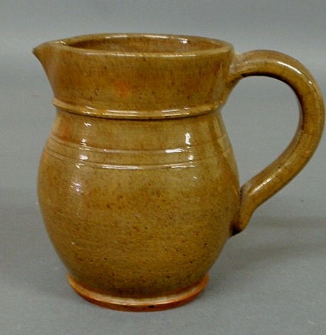 Appraisal: Redware pitcher with green glaze signed Made in Stahl s