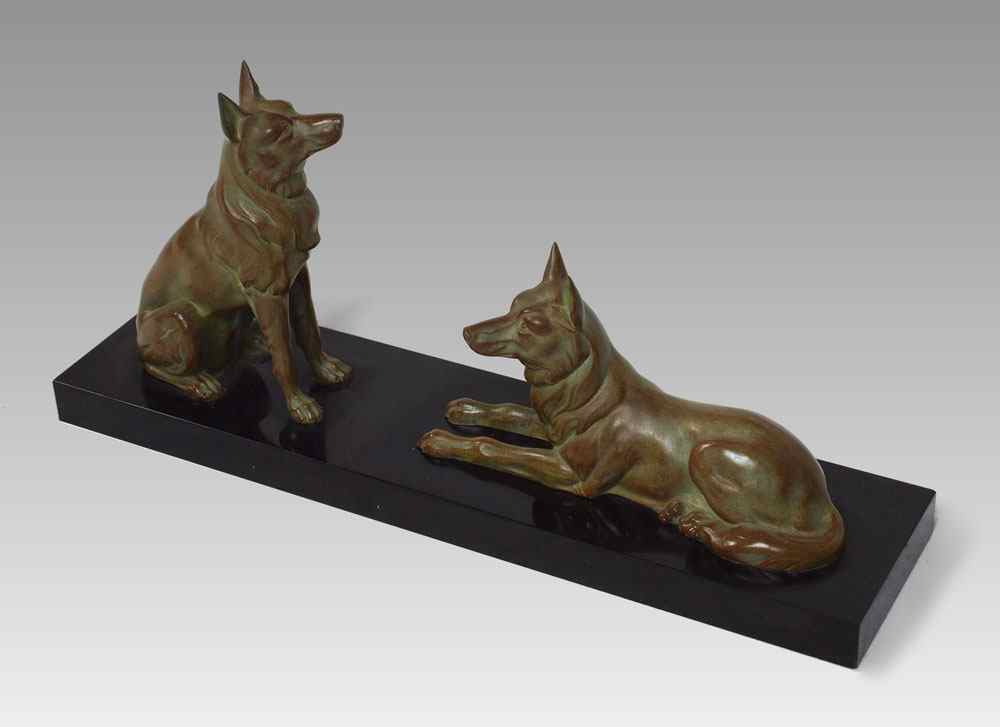 Appraisal: PATINATED GERMAN SHEPHERDS SCULPTURE '' h x '' w affixed