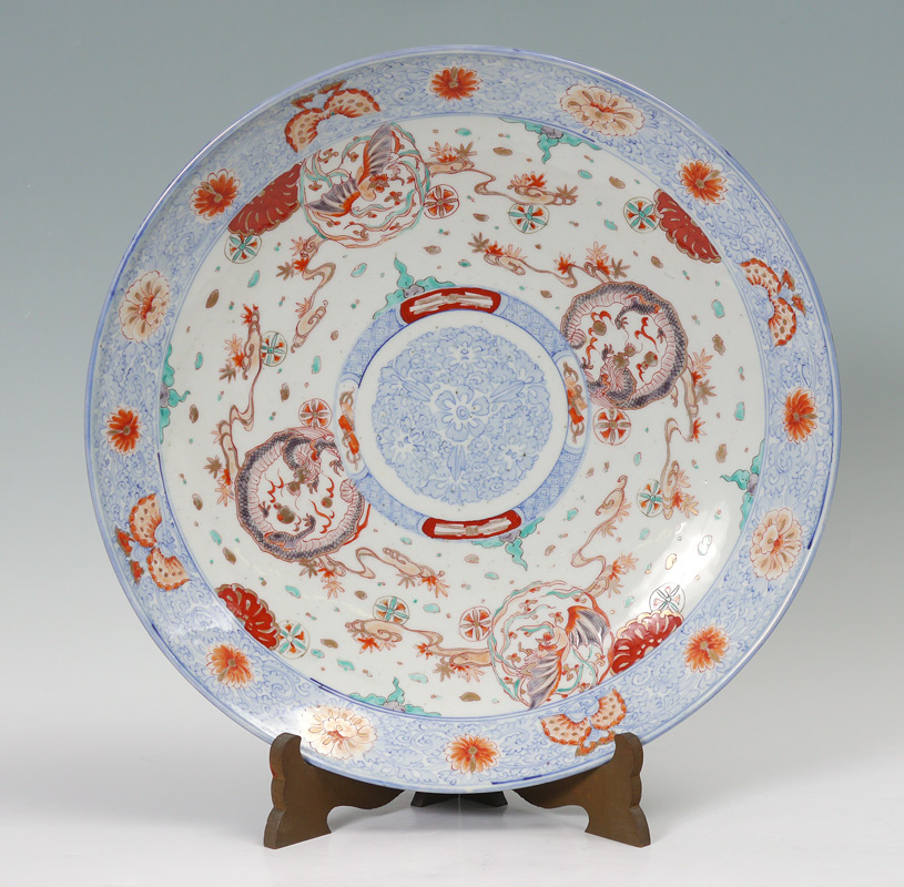 Appraisal: LARGE ORIENTAL POLYCHROME CHARGER Blue decorated rim with floral accents