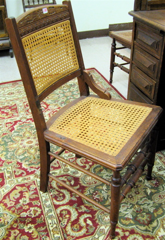 Appraisal: FIVE VICTORIAN WALNUT CHAIRS with caned backs and seats Eastlake