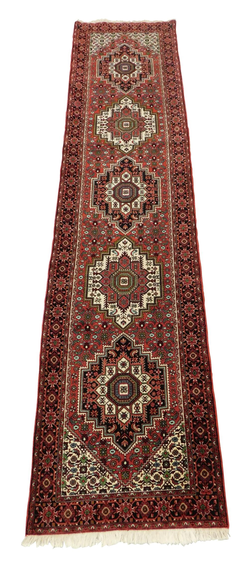 Appraisal: RUG Modern Persian Karaja wool on cotton red field with