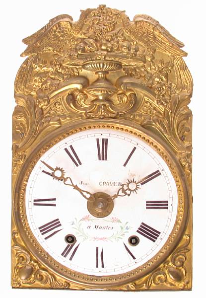 Appraisal: A French gilt repousse brass wall clock height ft