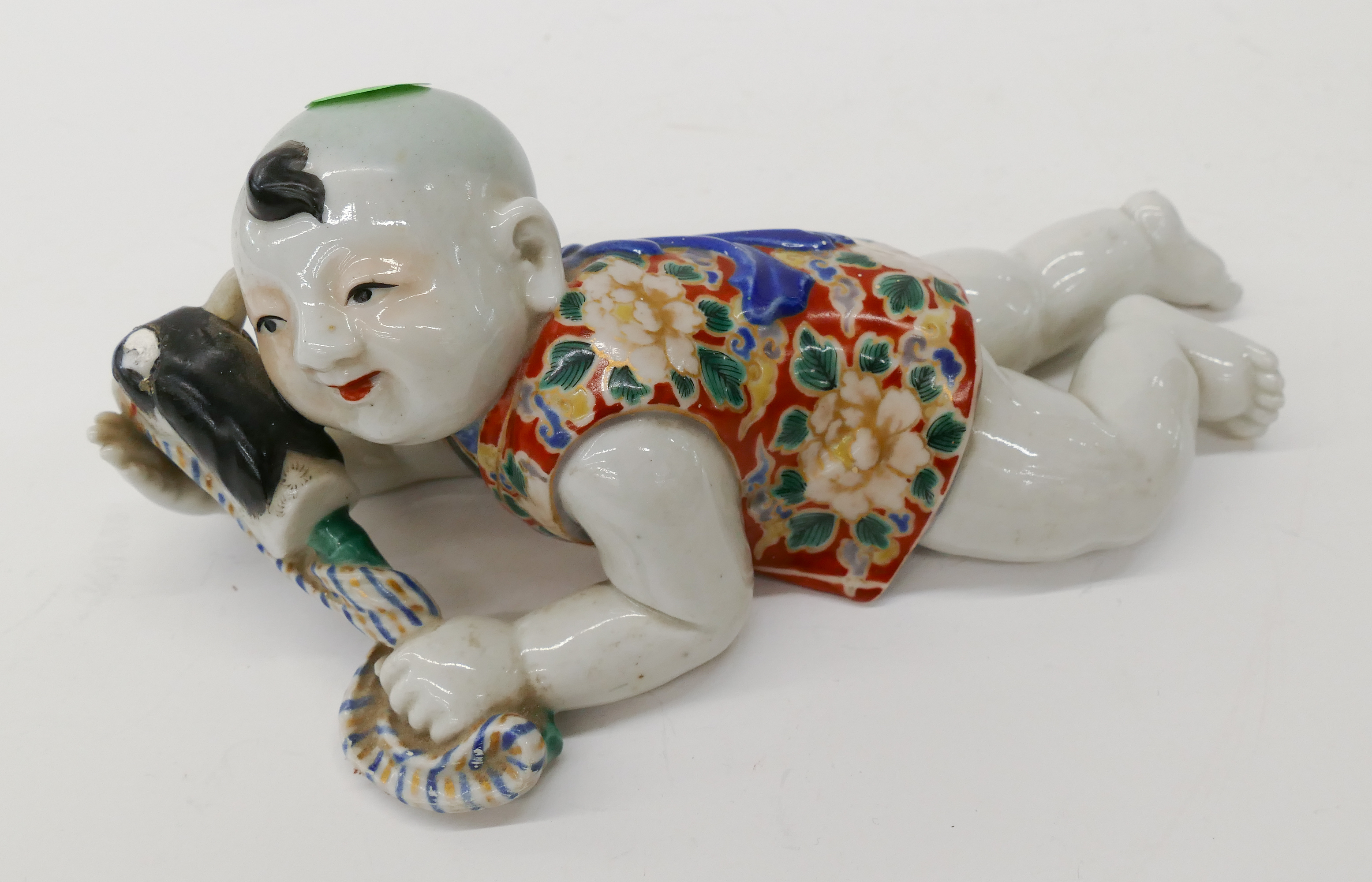 Appraisal: Antique Japanese Kutani Crawling Boy Figure- chip- ''