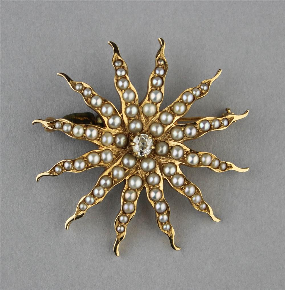 Appraisal: PEARL AND DIAMOND K GOLD SUNBURST PIN the pin has