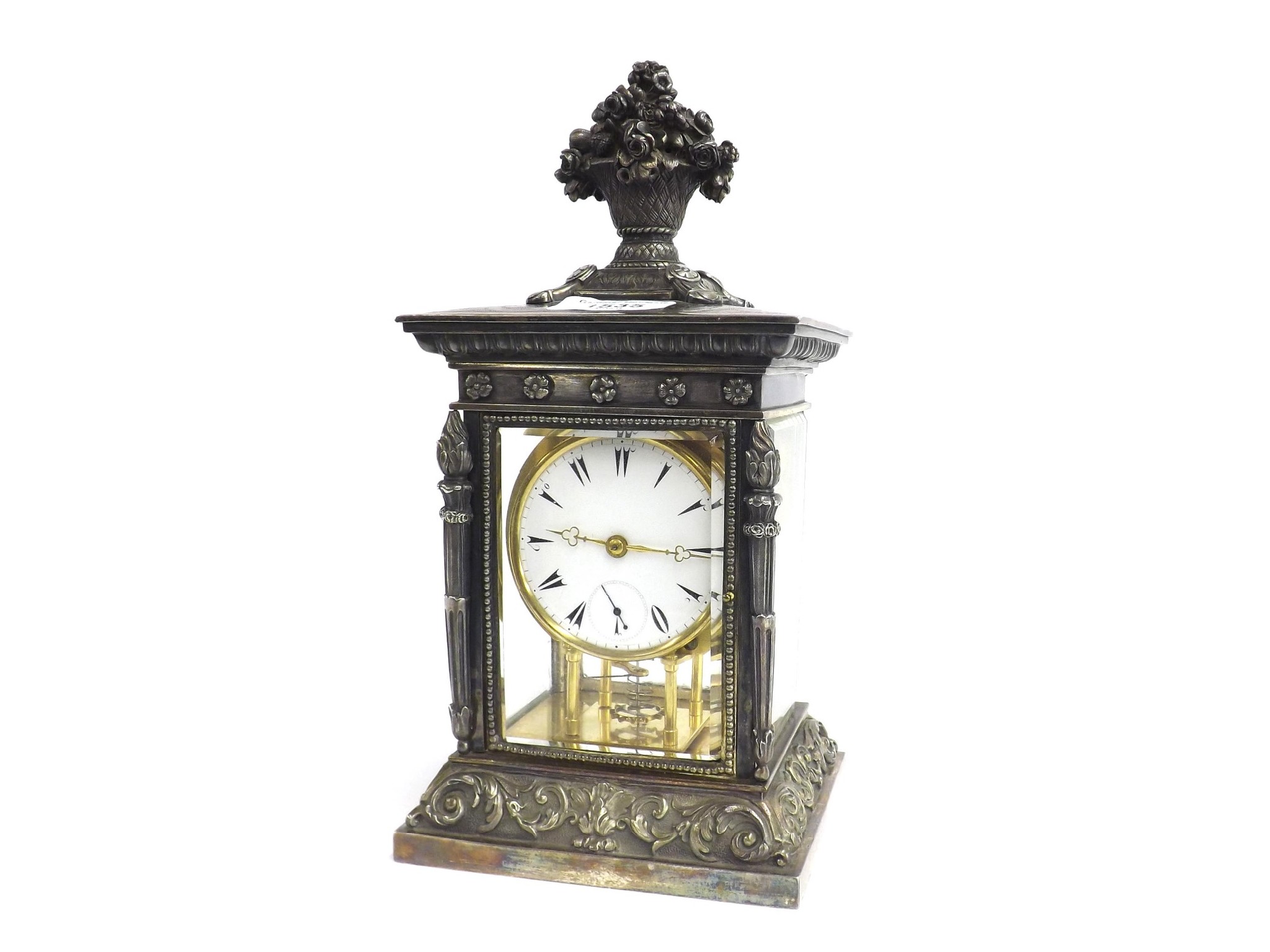 Appraisal: Unusual small silvered brass two train four glass mantel clock