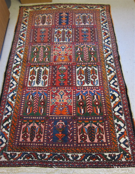 Appraisal: PERSIAN BAKHTIARI TRIBAL GARDEN RUG Chaharmahal and Bakhtiari Province western