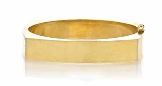 Appraisal: A Karat Yellow Gold Hinged Bangle Bracelet with squared edges