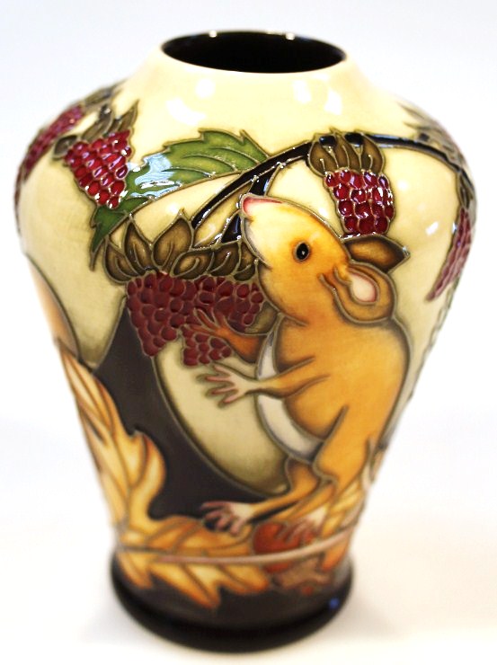 Appraisal: A Moorcroft pottery Field Mouse and Berry vase by Vicky