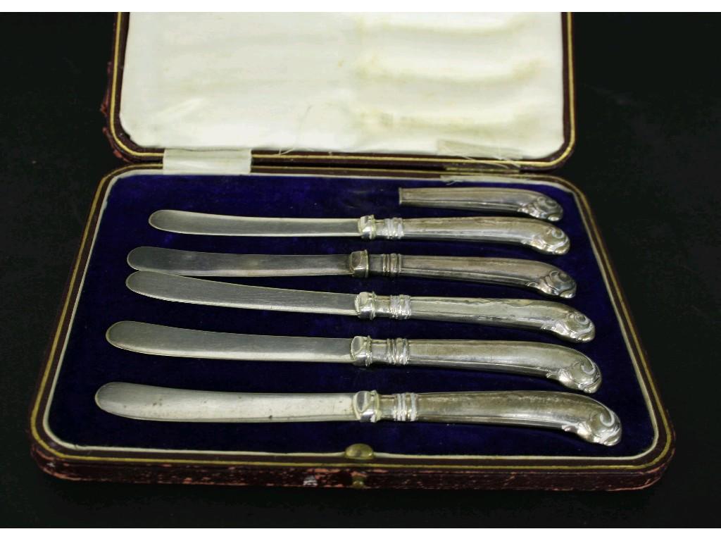 Appraisal: Cased set of six silver pistol handled butter knives with