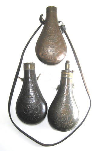 Appraisal: THREE PEACE TYPE POWDER FLASKS the first marked BATTY and