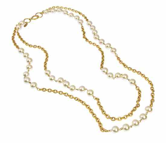 Appraisal: A Chanel Double Strand Goldtone and Faux Pearl Necklace with