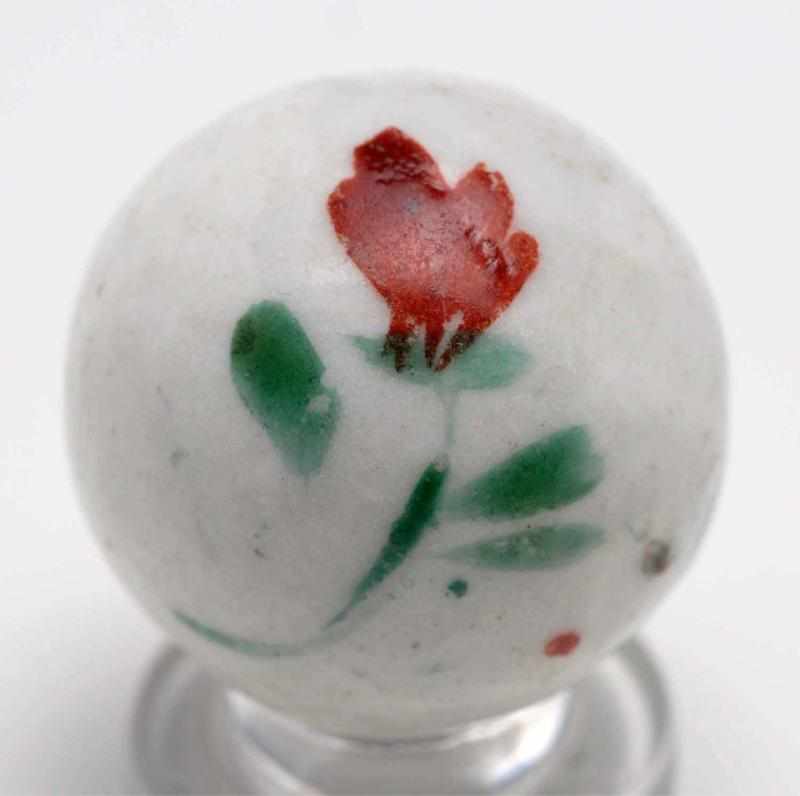 Appraisal: Flower China Marble Description Glazed red flower and leaf design