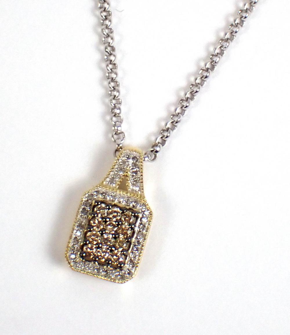 Appraisal: CHAMPAGNE AND WHITE DIAMOND PENDANT NECKLACE with an sterling silver