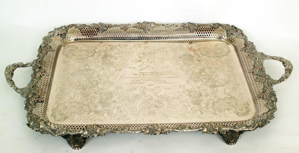 Appraisal: LARGE SILVER-PLATED TWO-HANDLED TRAY of shaped rectangular form the pierced