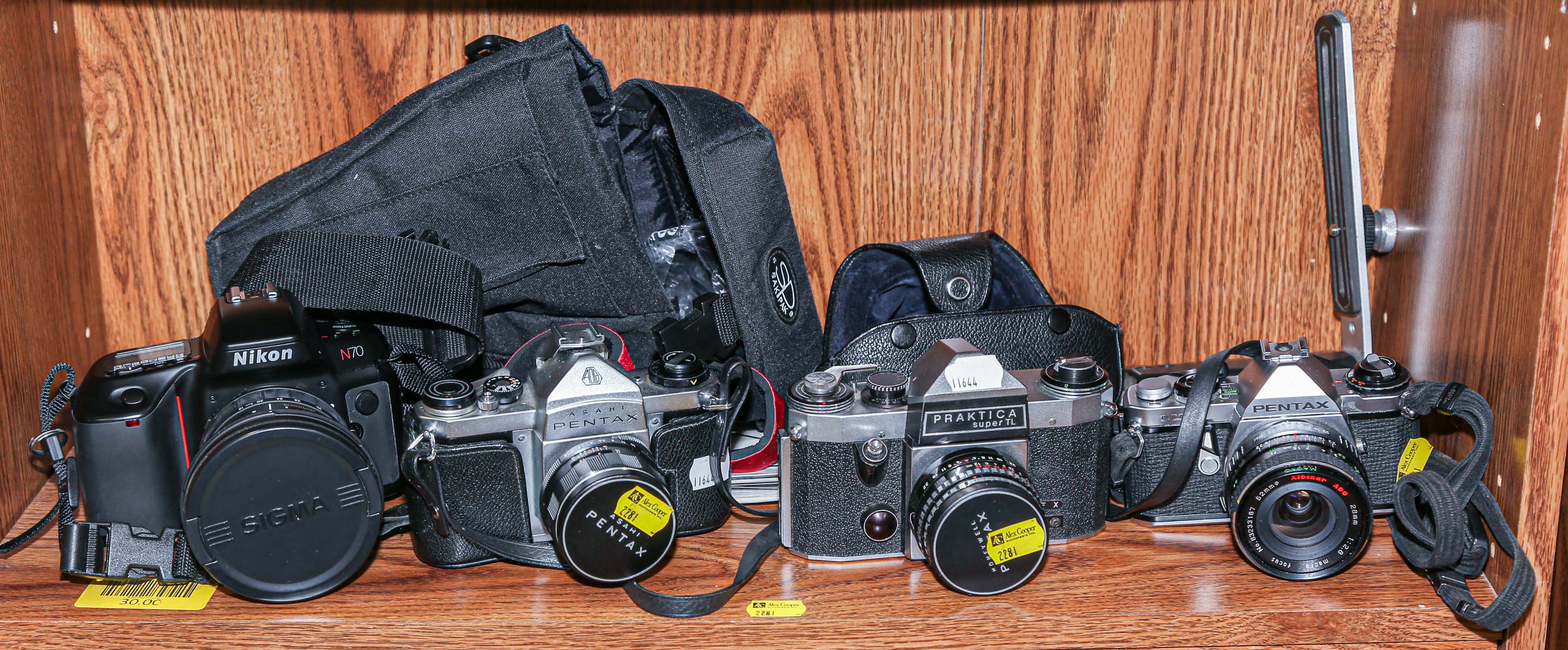 Appraisal: FOUR ASSORTED CAMERAS Including Pentax Asahi and a Pentax Asahi-ME