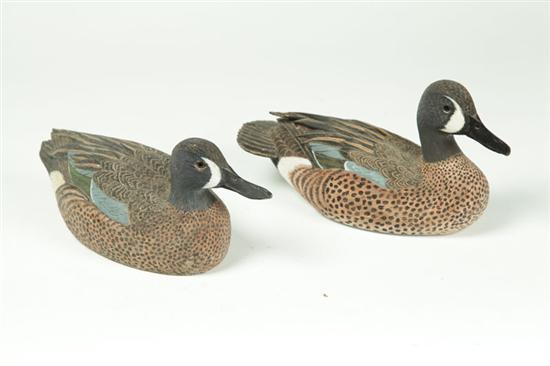 Appraisal: TWO DUCK CARVINGS American late th century wood Competitive carvings