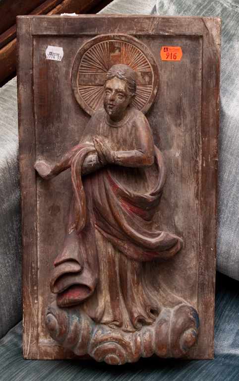 Appraisal: Hispanic carved and polychrome relief Santos figure with wood backing