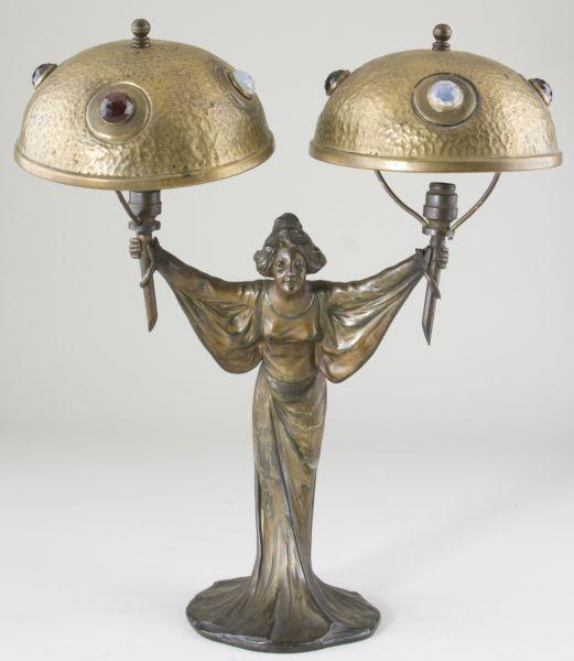 Appraisal: Art Nouveau Figural Lamp a bronze tone maiden in flowing