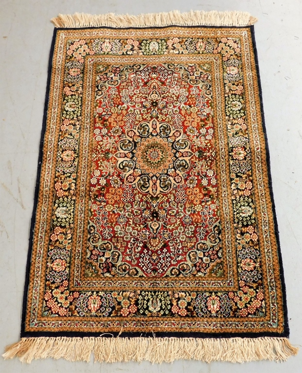 Appraisal: SILK RED AND BLUE FLOWER MEDALLION PRAYER RUG th CenturyGeometric